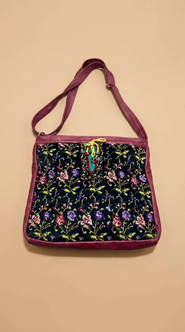 Handbag with floral pattern on a beige background