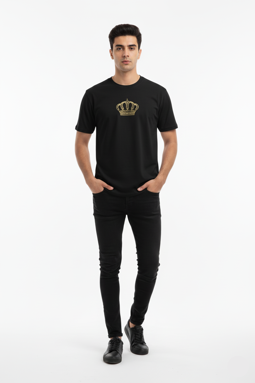 Man wearing a black t-shirt with a gold crown logo on a white background
