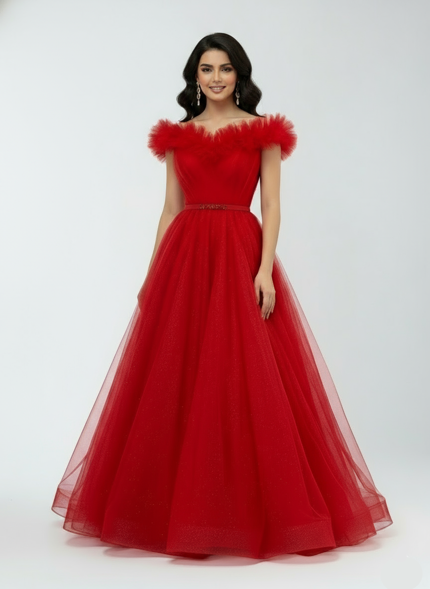 Red evening gown with feathered shoulders on a white background