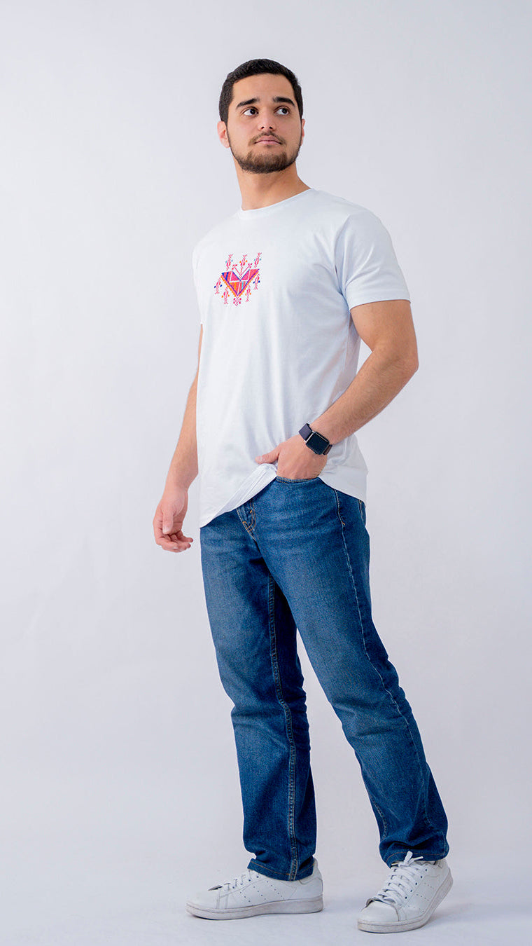 Man wearing a white t-shirt with a red logo and blue jeans on a white background