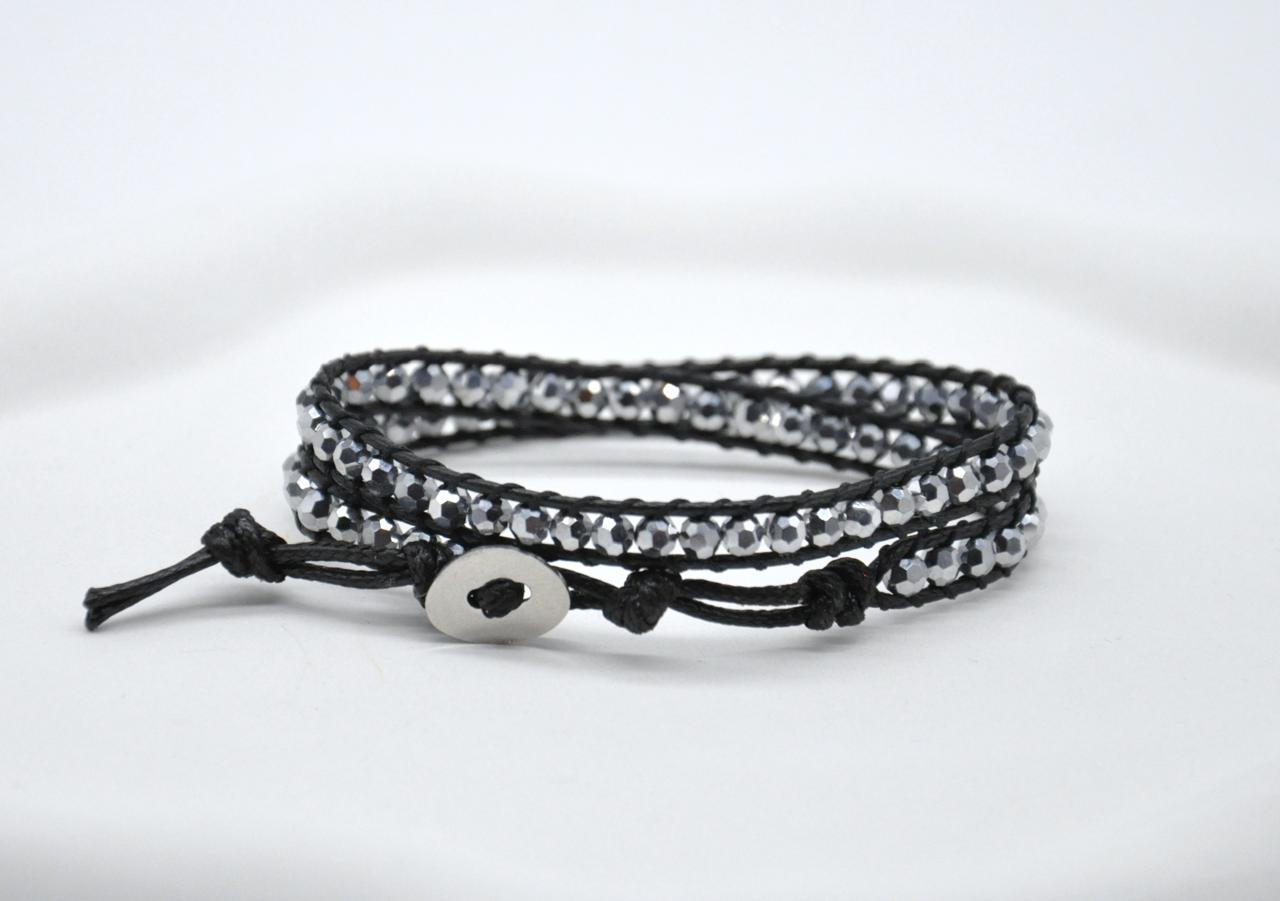 Black and silver beaded bracelet on a white background