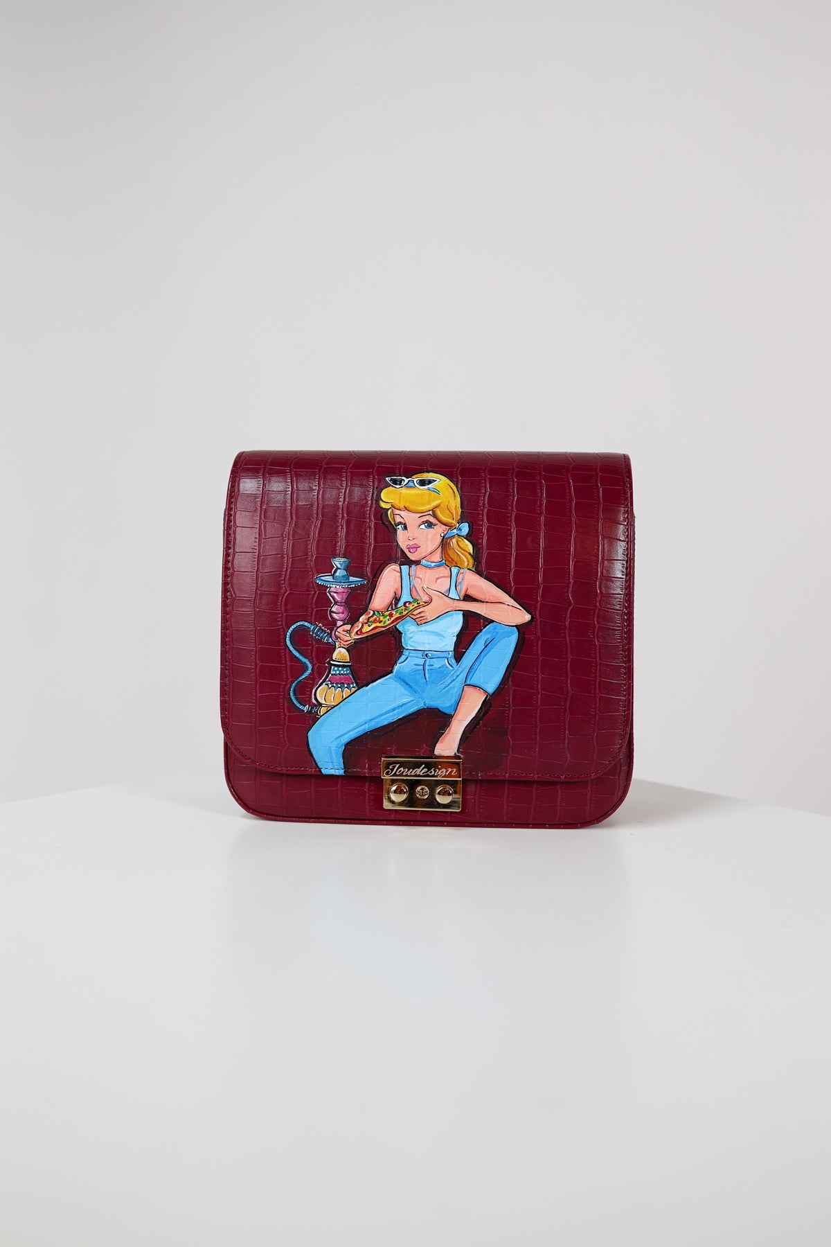 Red handbag with a graphic of a woman smoking a hookah on a white background