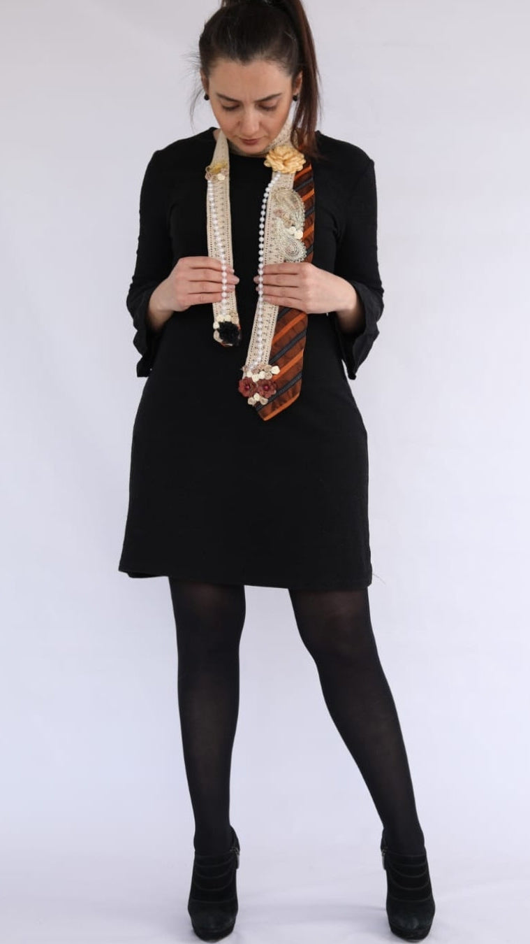 Woman holding a decorative object against a white background