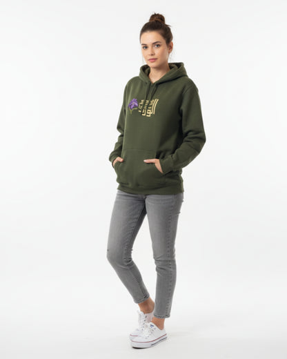 Woman wearing a green hoodie with a logo on a white background