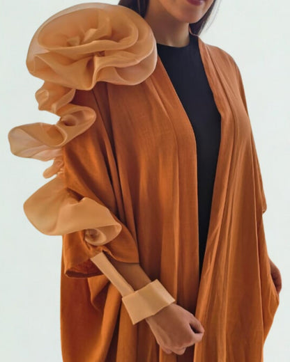 Orange floral dress with a plain background