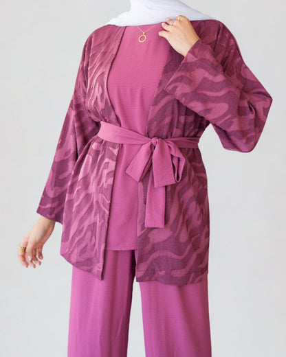 Purple outfit with a patterned jacket and pants on a white background