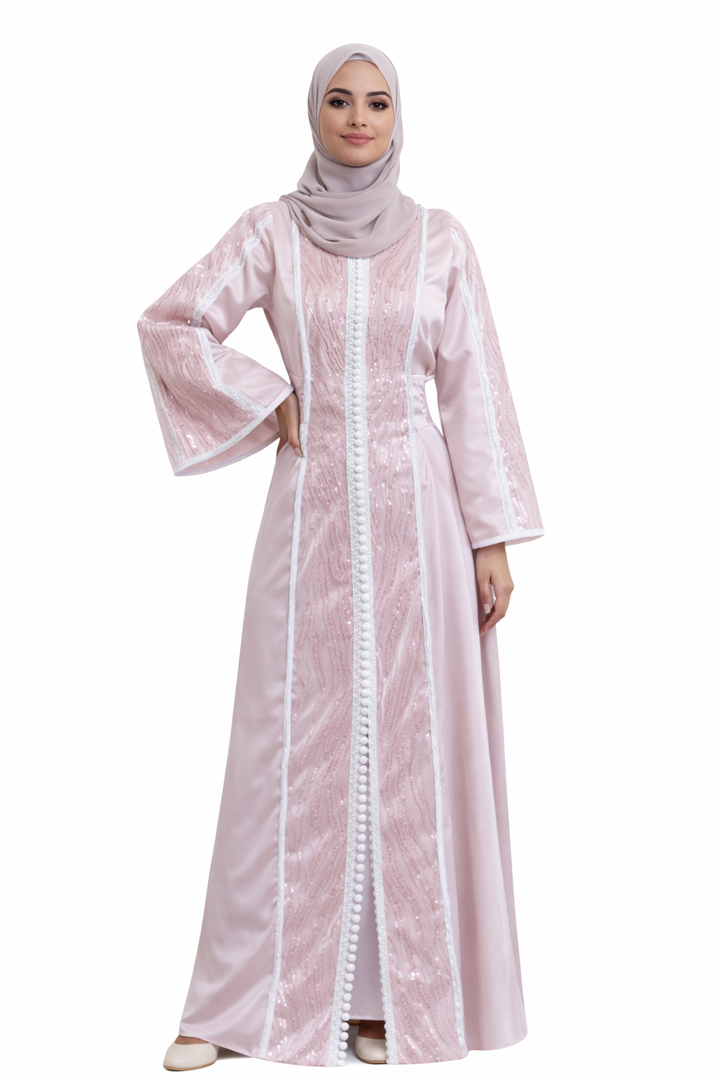 Woman wearing a light pink abaya with a white hijab on a white background