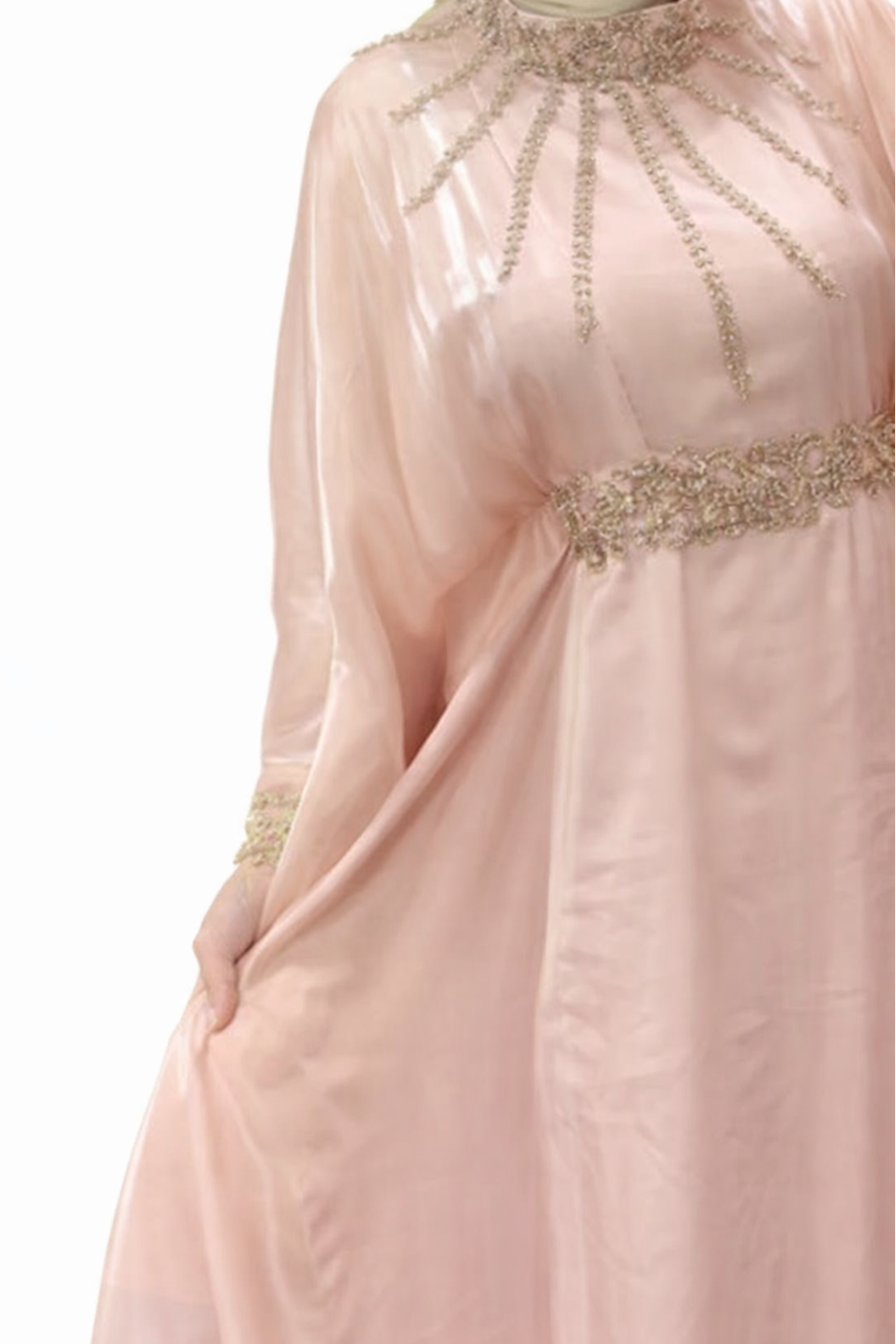 Pink dress with intricate beading details on a white background