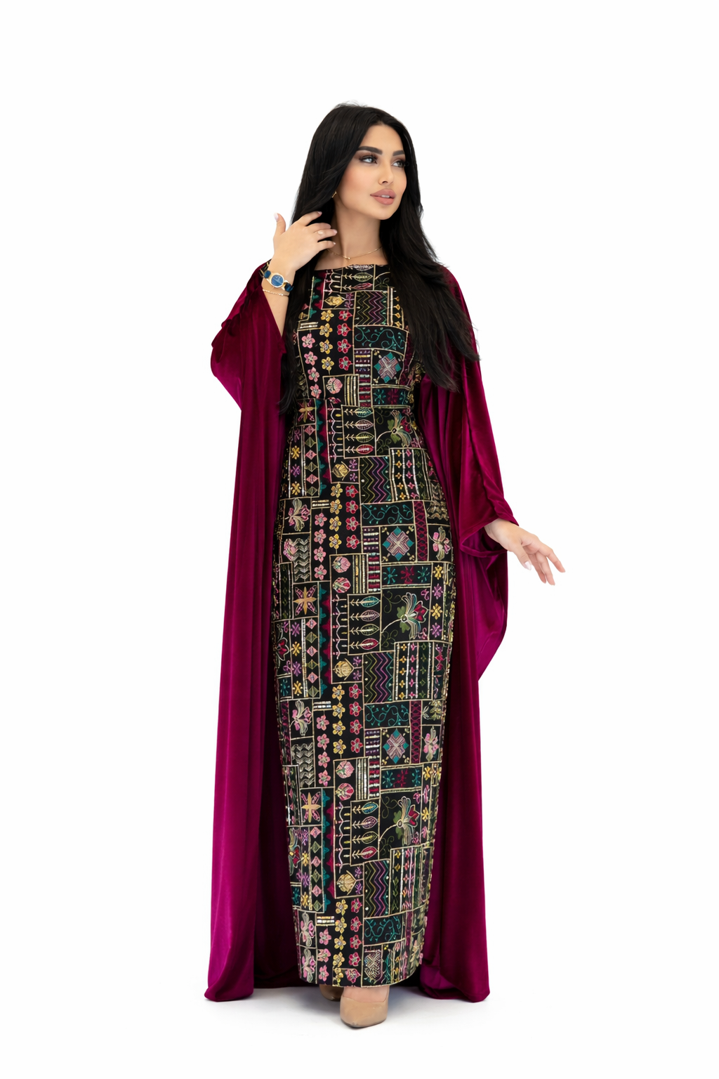 Woman wearing a patterned dress with a maroon dupatta on a white background
