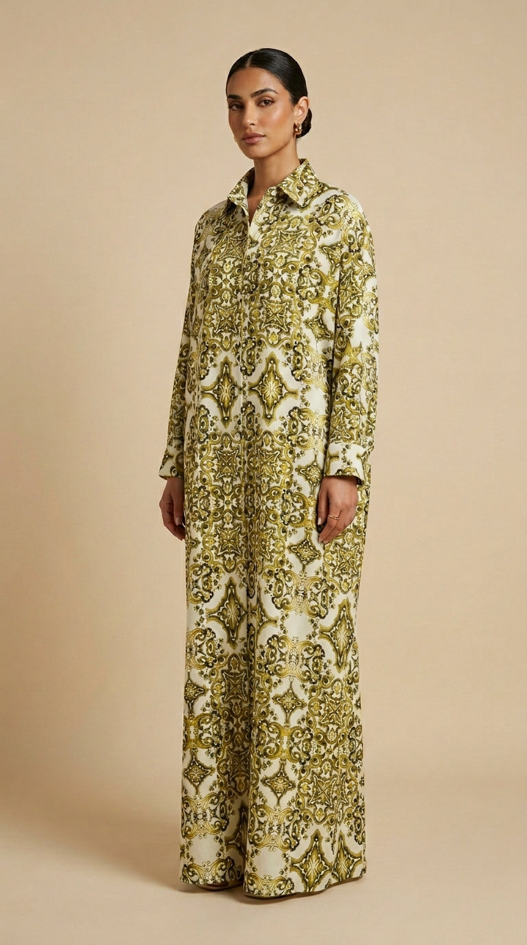Woman wearing a green and white patterned outfit on a beige background