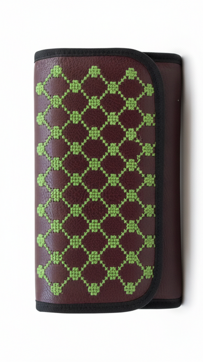 Wallet with green geometric pattern on a white background
