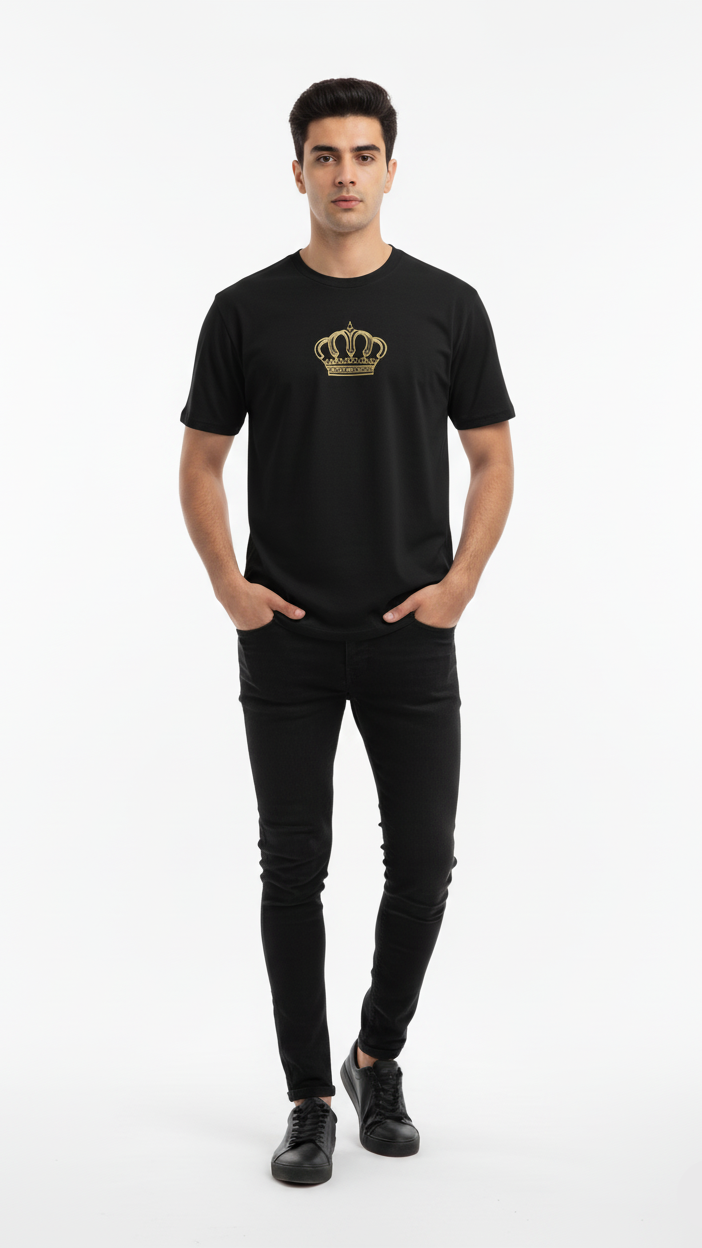 Man wearing a black t-shirt with a gold crown logo on a white background