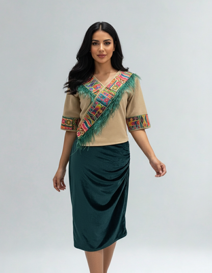 Woman wearing a traditional outfit with a colorful top and green skirt on a gray background
