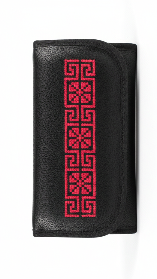 Black wallet with red geometric pattern on a white background