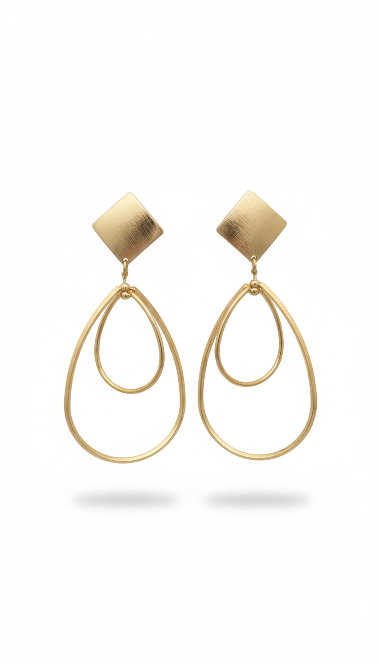 Gold earrings with a geometric design on a white background