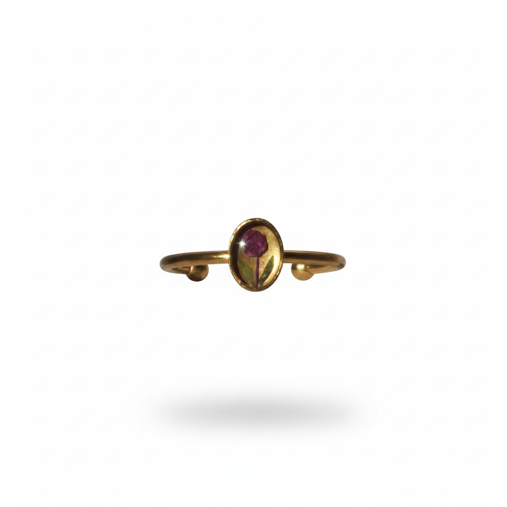 Gold ring with a gemstone on a white background