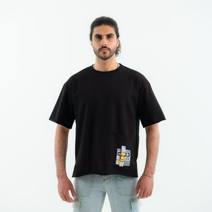 Man wearing a black t-shirt with a graphic design on a white background