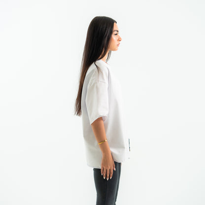 Woman wearing a white shirt on a white background