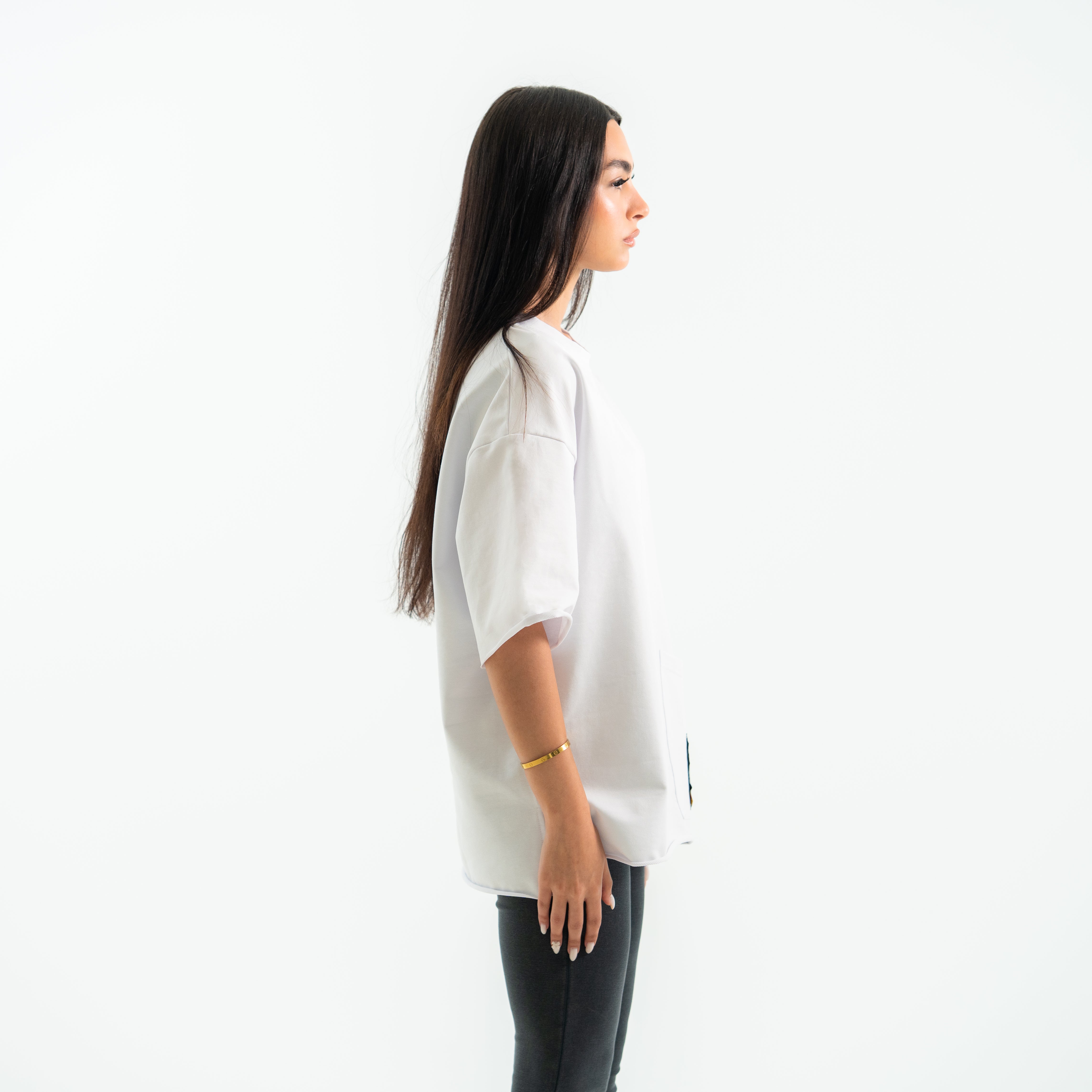 Woman wearing a white shirt on a white background
