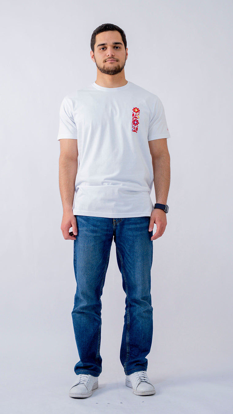 Man wearing a white t-shirt with red text and blue jeans on a white background