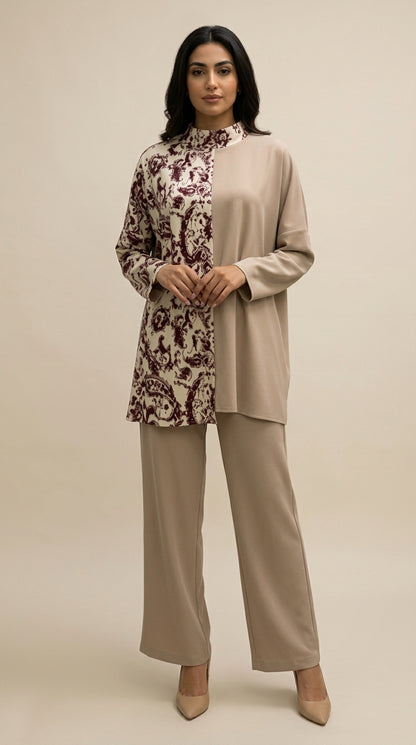 Woman wearing a beige and floral outfit on a beige background
