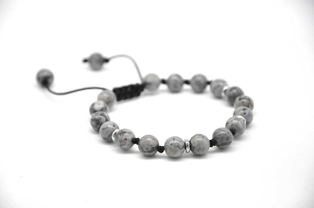 Gray beaded bracelet on a white background