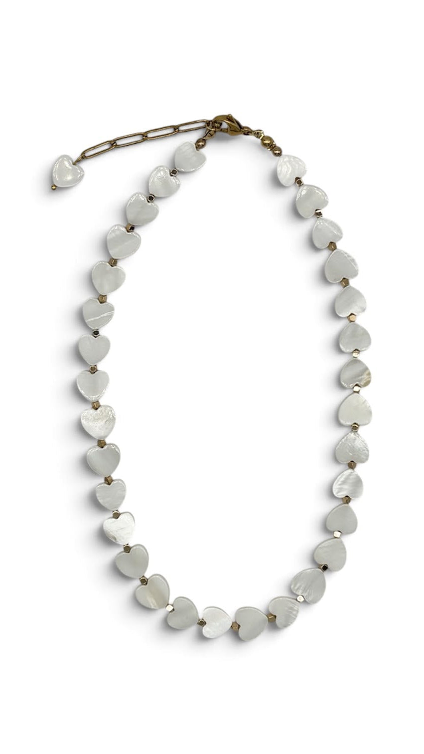 A heart-shaped shell bead necklace with an antique bronze chain clasp, displayed on a clean white background.