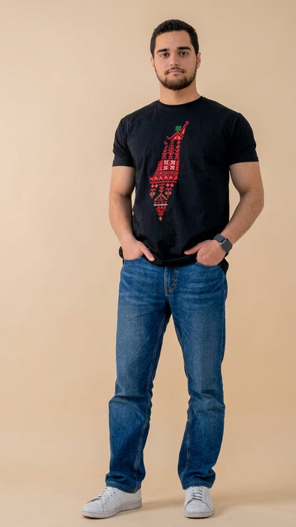 Man wearing a black t-shirt with a red graphic design and blue jeans on a beige background