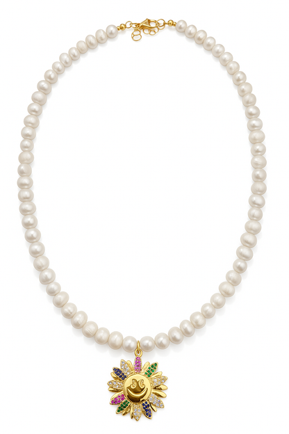 Pearl necklace with a colorful pendant on a white background