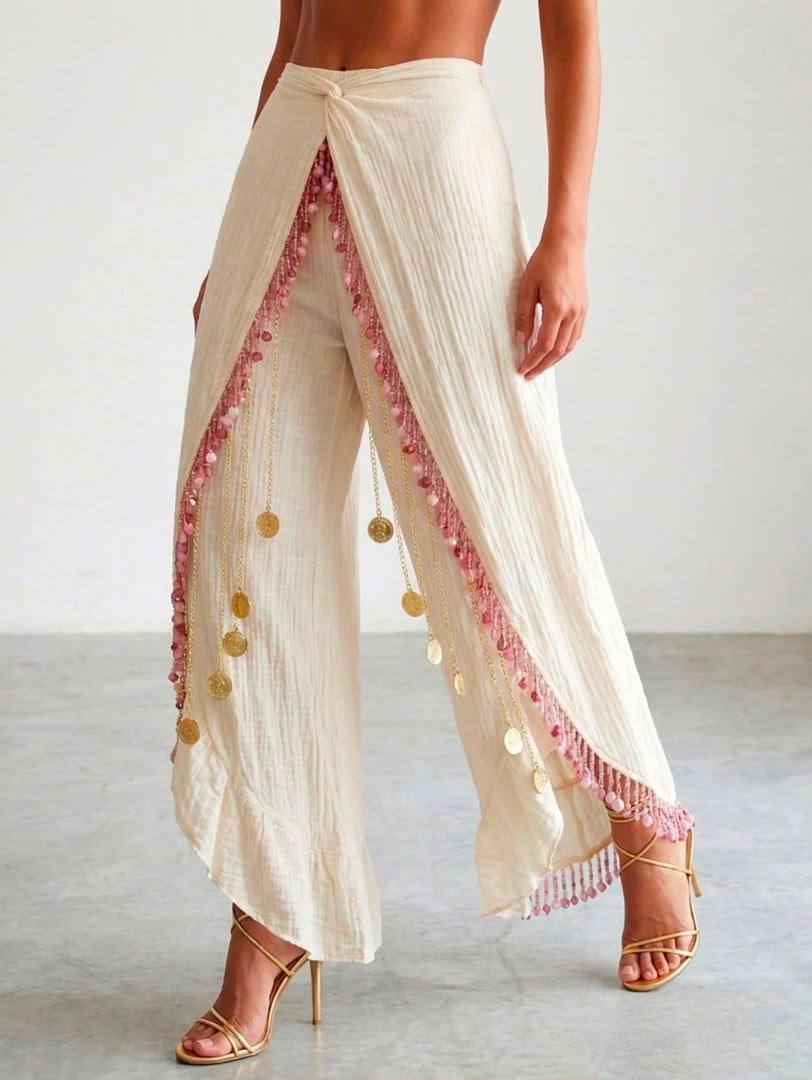 Gauze Wrap Trousers — detail of the hand-beaded fringe